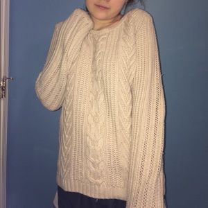 Oatmeal color knit sweater.